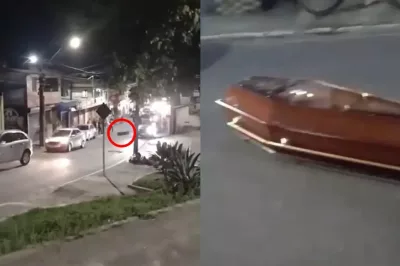 Caixão cai de de carro funerário e fica na pista em via pública de Camaçari