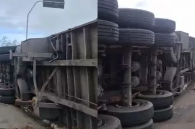 Asfalto cede e reboque de carreta tomba às margens da BR-324 em Riachão do Jacuípe